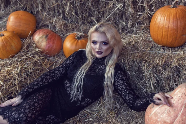 Halloween location with a young blonde — Stock Photo, Image