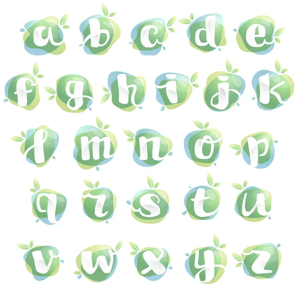 Alphabet letters with negative space at green watercolor splash — Stock Vector