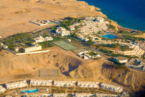 Egypt from bird 's-eye view, hotel building and red sea
