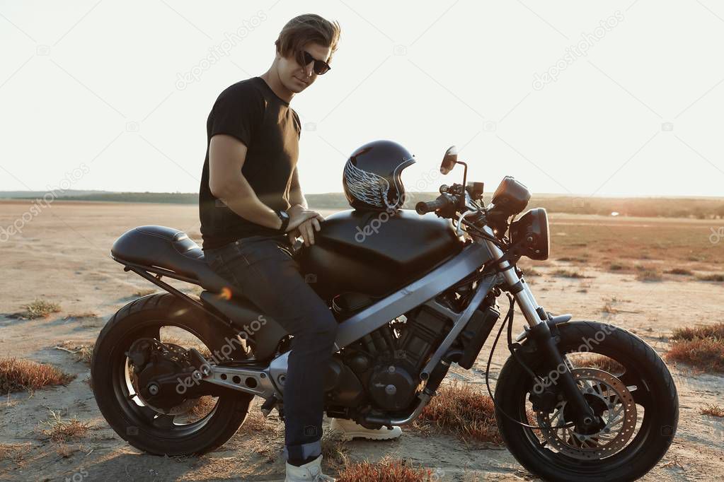 Nice man on  the motorcycle, in the middle of the desert, helmet, muscles, sun glasses, sand, tires, risky, free, outdoor, hairstyle, sport, relax, adventure, lifestyle, tires, chillout