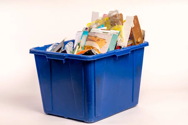 Recycle Container with cardboard, glass, plastic and other assorted