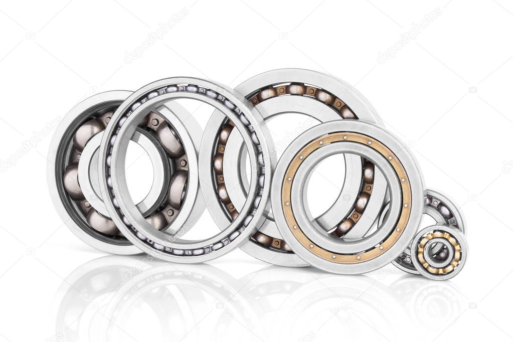 Composition of steel ball roller bearings in closeup isolated on