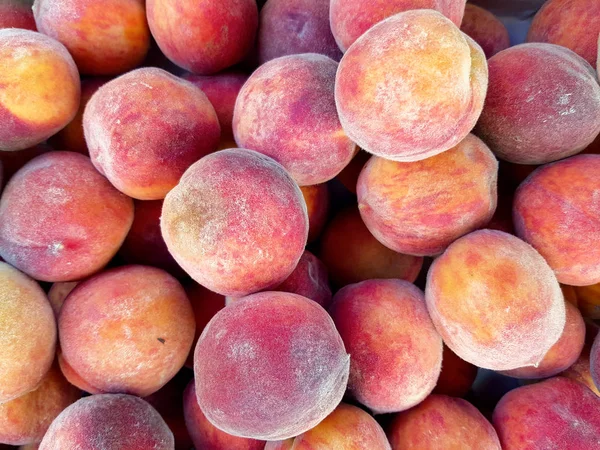 Viele Reife Pfirsiche Als Hintergrund Pfirsiche Werden Auf Dem Markt — Stockfoto