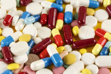 Çok renkli tablet arka plan olarak dağılmış. tex için alan