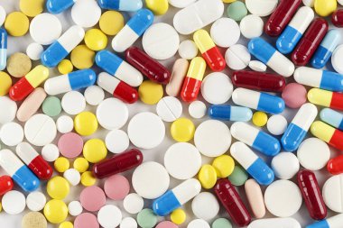 Çok renkli tablet arka plan olarak dağılmış. tex için alan