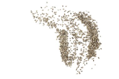 beyaz bir arka plan üzerinde dağınık kenevir tohumu izole