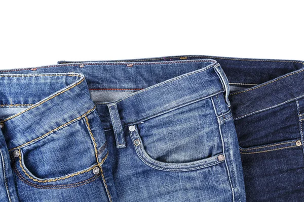 Jeans diferentes no fundo branco — Fotografia de Stock