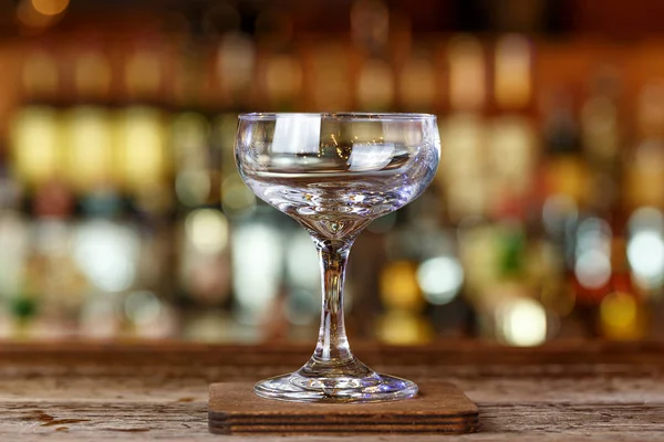 Empty cocktail glass at the bar Stock Image