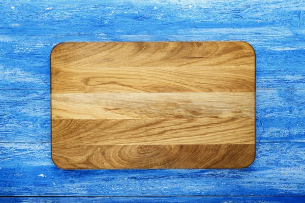 Tagliere di legno come sfondo — Foto Stock