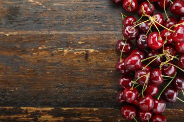 Tatlı kiraz arka planı. Üst görünüm. metin alanı