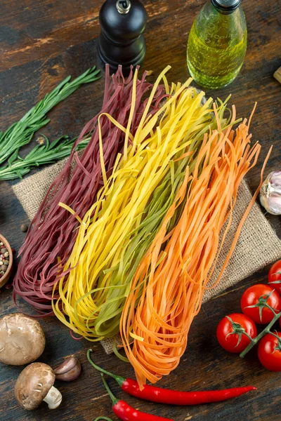 Italian multi colored pasta. Italian food concept. Ingredients for making pasta.