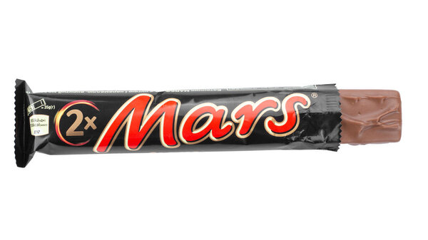 Ukraine, Kyiv - March 29. 2018: Close Up of unwrapped Mars candy chocolate bar made by Mars Inc. File contains clipping path.
