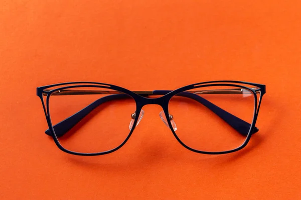 Gafas Para Visión Marcos Azules Sobre Fondo Naranja Accesorios Moda —  Fotos de Stock