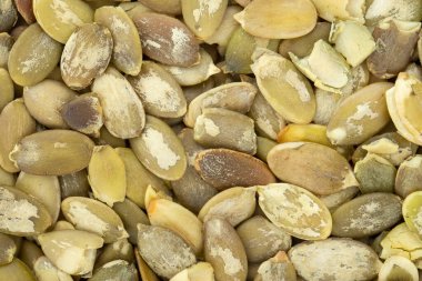 Yeşil kabak tohumlarının makro arkaplan dokusu. Üst görünüm.