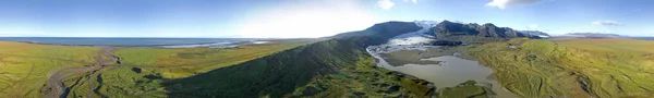 360 degrees Icelandic aerial landscape. 360 panorama of the Fjallsarlon glacier and the lagoon on a sunny day.