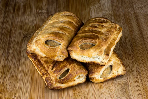 Rotoli Salsiccia Pasticceria Tavolo Legno — Foto Stock