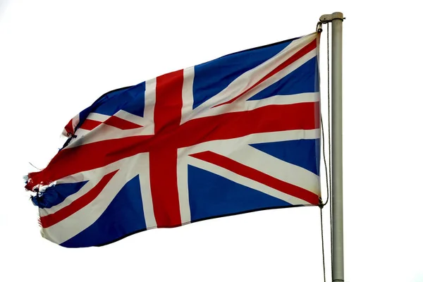 Tattered United Kingdom Flag Fluttering in a Breeze — Stock Photo, Image