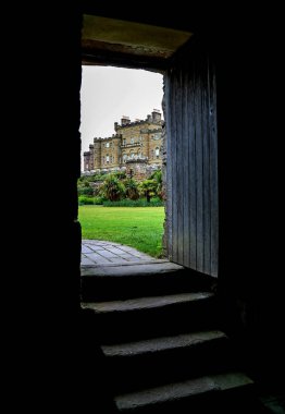 View of Culzean Castle Scotland Through an old Open Doorway clipart