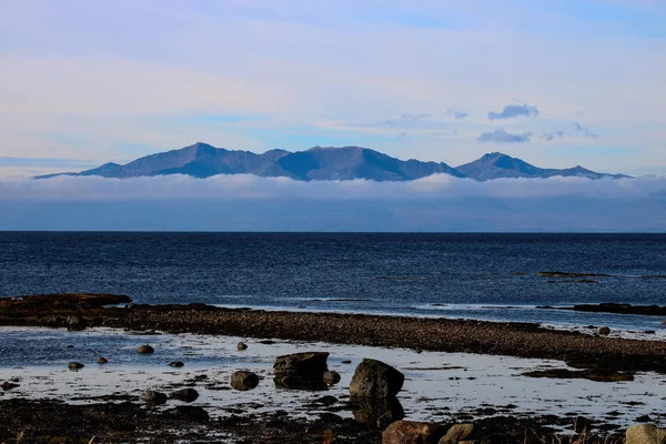 Isle of Arran Emerging from Low Cloud from Seamill Beach Scotlan — Stock Photo, Image