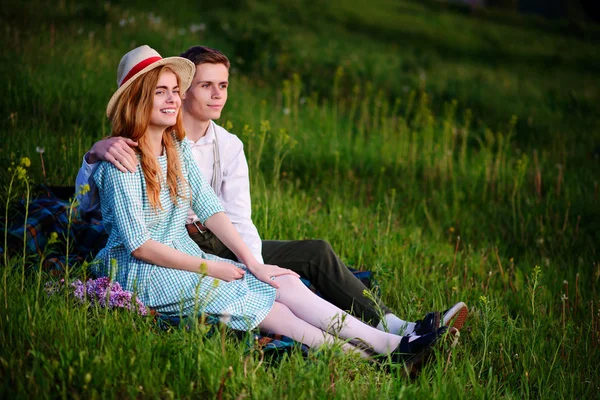 Young Couple Sitting Plaid Park Look Sunset — Stock Photo, Image