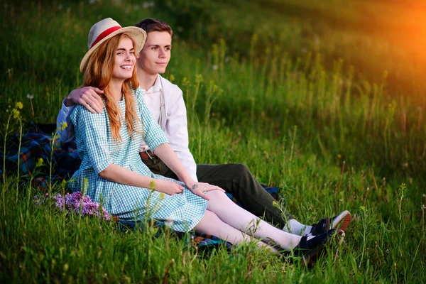 Young Couple Sitting Plaid Park Look Sunset — Stock Photo, Image