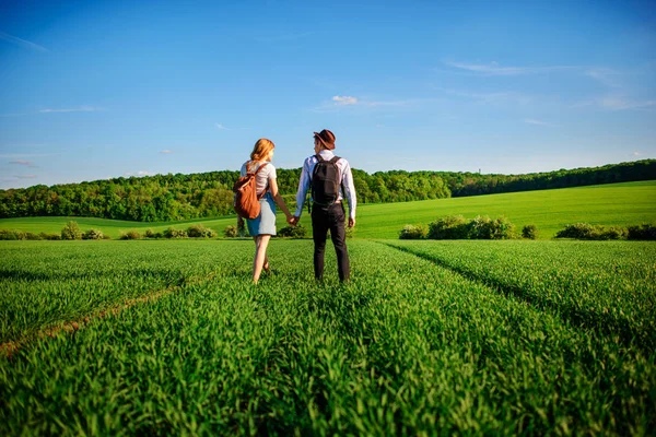 Backpack Man Hat Woman Long Hair Path Couple Walks Meadow — Stock Photo, Image