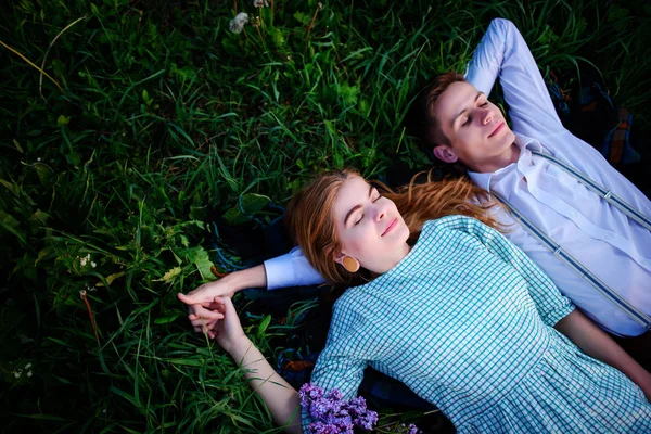 Young Couple Lying Grass Relax View Stock Photo