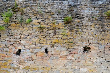 kaçamak gri taş ile eski ortaçağ kalesi duvar dokusu.