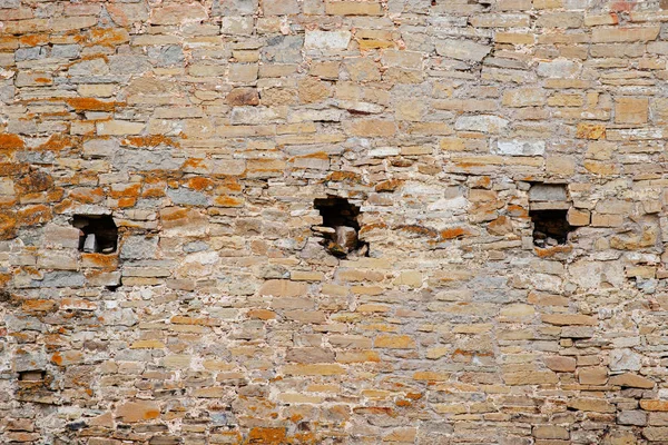 旧中世纪城堡墙的纹理与灰色石头的漏洞 — 图库照片