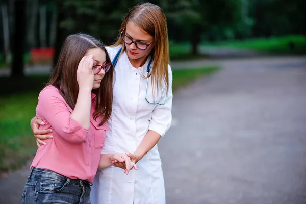 Caring Doctor Nurse Taking Young Patient Outdoors Patient Became Ill Stock Photo