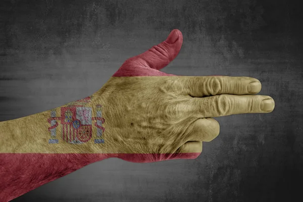 Σημαία Ισπανίας Ζωγραφισμένα Στο Ανδρικό Χέρι Όπως Ένα Πυροβόλο Όπλο — Φωτογραφία Αρχείου