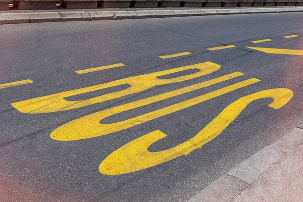 City bus station transport lane sign on the asphalt road