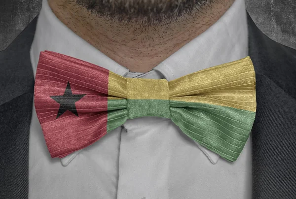 Guinea Bissau flag on bowtie business man suit