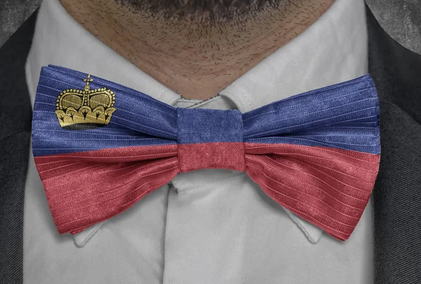 National flag of Liechtenstein on bowtie business man suit
