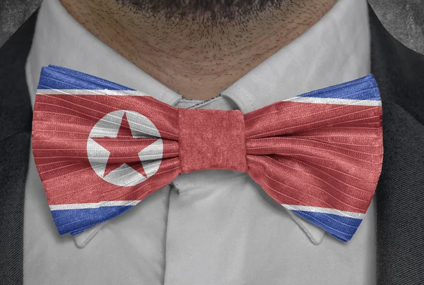 National flag of North Korea on bowtie business man suit