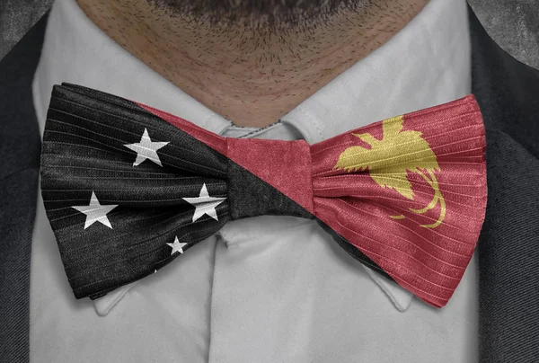 National flag of Papua New Guinea on bowtie business man suit