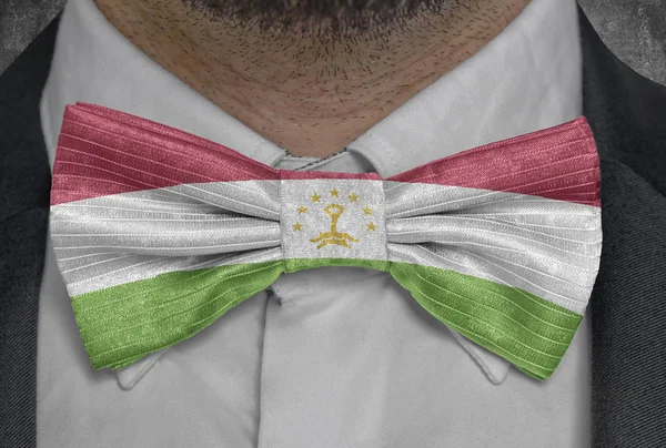National flag of Tajikistan on bowtie business man suit