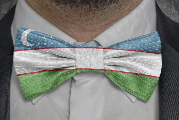 National flag of Uzbekistan on bowtie business man suit