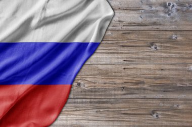 Wooden pattern old nature table board with Russia flag