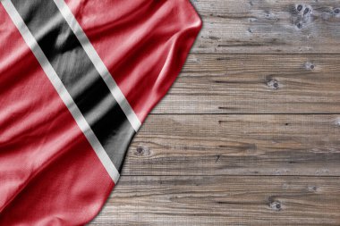 Wooden pattern old nature table board with Trinidad and Tobago flag
