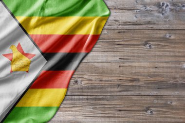Wooden pattern old nature table board with Zimbabwe flag