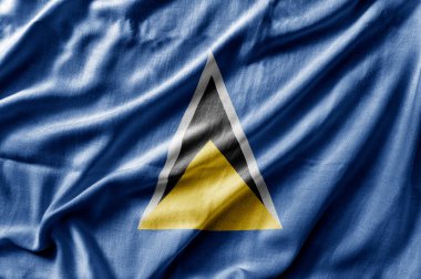 Saint Lucia 'nın ulusal bayrağını sallıyor.