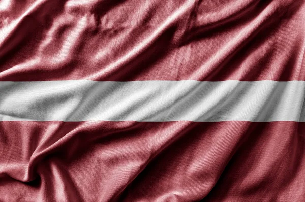 Viftar Med Lettlands Nationella Flagga — Stockfoto