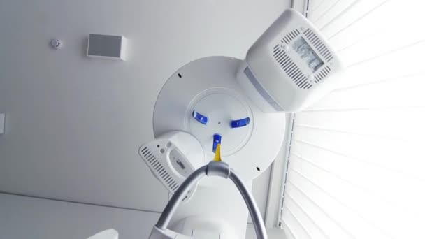 Modern panoramic rotating digital X-ray machine at dentist office. Dental clinic equipment. Bottom view. — Stock Video