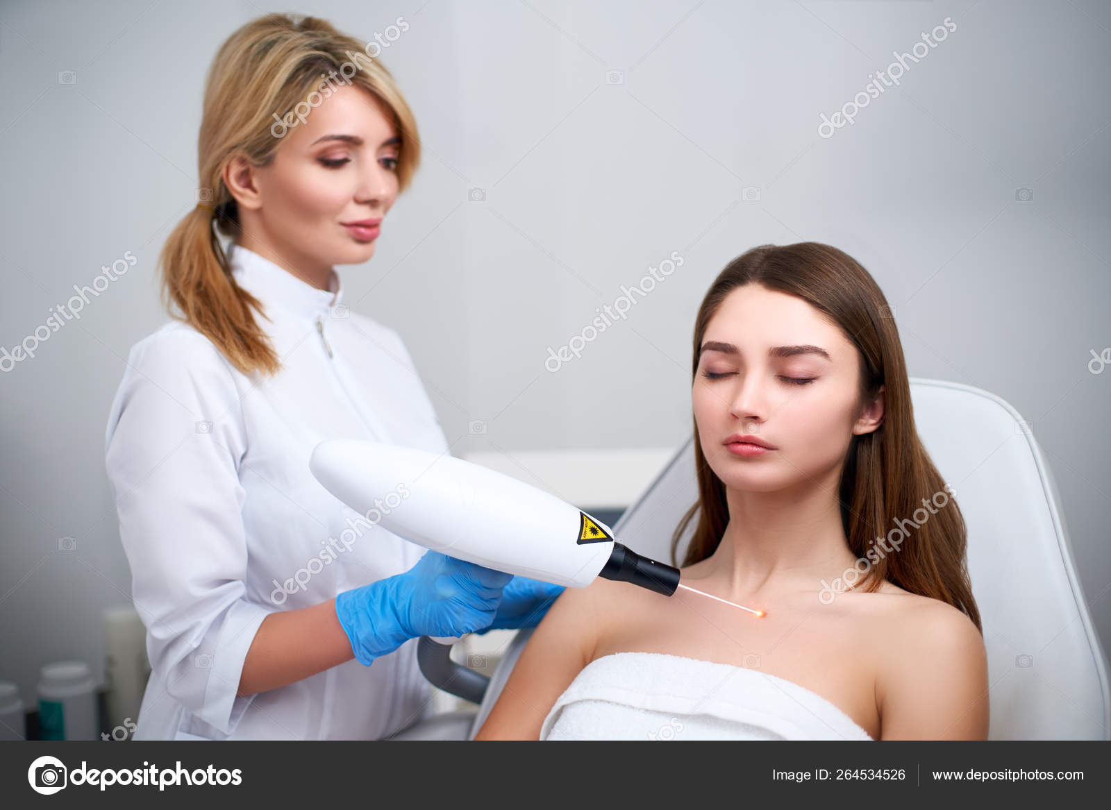 Laser Mole Removal On A Womans Chest In A Beauty Salon Hardware