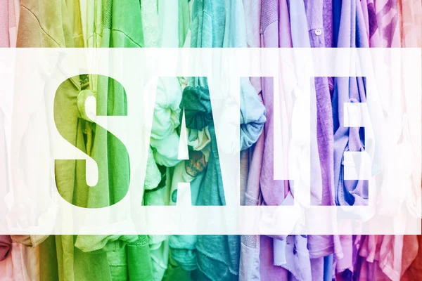 Rainbow background with clothes. — Stock Photo, Image