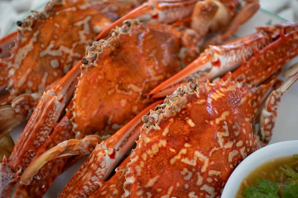 Cooked Flower crab or Blue crab with Thai seafood sauce.