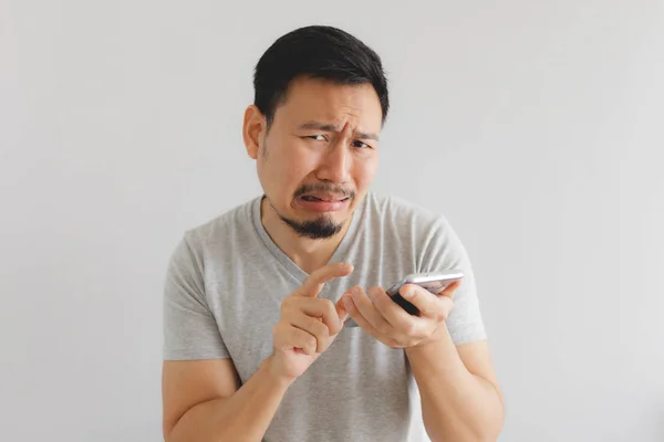 Man cry and sad with what show on the smartphone. — Stock Photo, Image