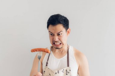 O onun diyet ya da lezzetli değil ne bekleniyor değil gibi adam sosis kızgın.