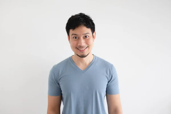 Portrait of happy man in blue t-shirt on isolated white background. — Stock Photo, Image